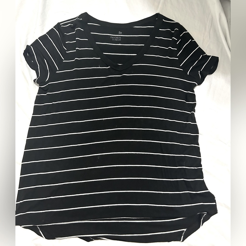A black and white striped So shirt in a size medium.